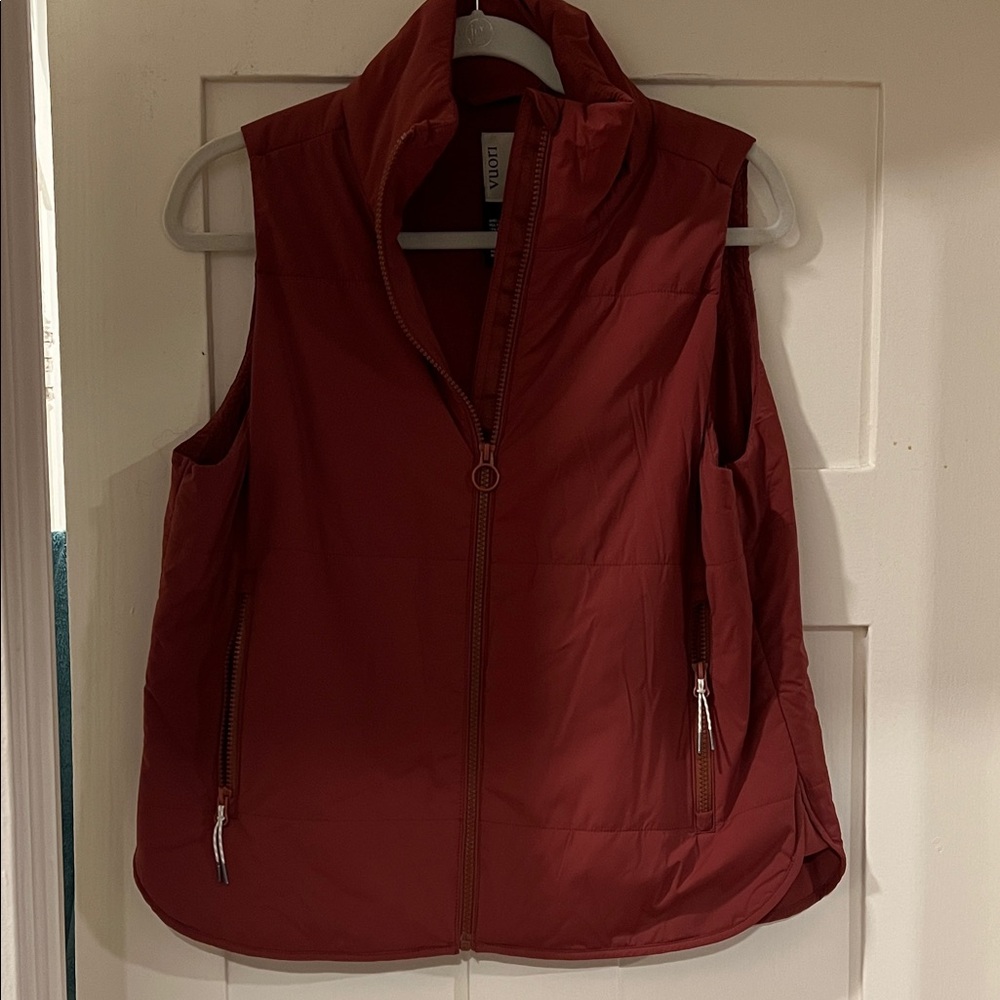 Vuori Canyon Insulated Vest in the color Currant